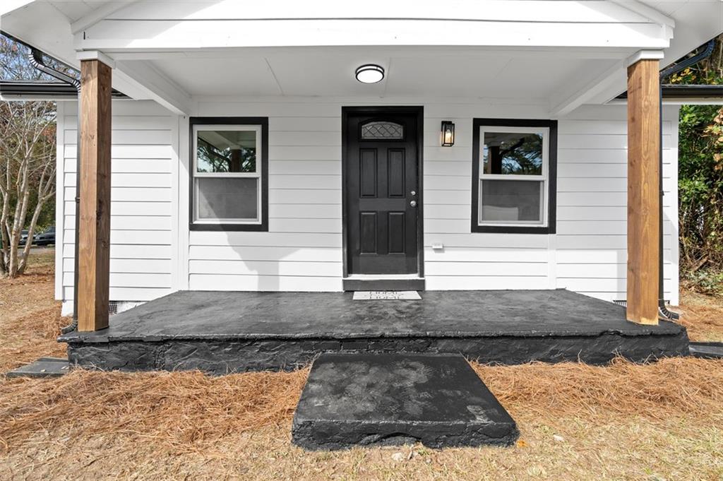 118 Perry Street Monroe, GA 30655 - Photo 3 of 30 a view of a entryway of the house