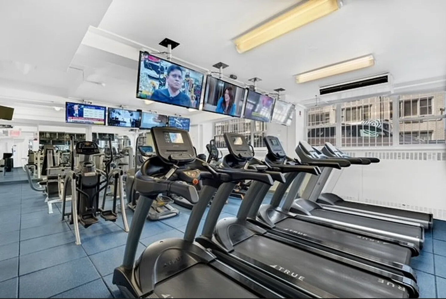 25 Sutton Place South, Unit 14A Manhattan, NY 10022 - Photo 15 of 17 a view of a room with gym equipment