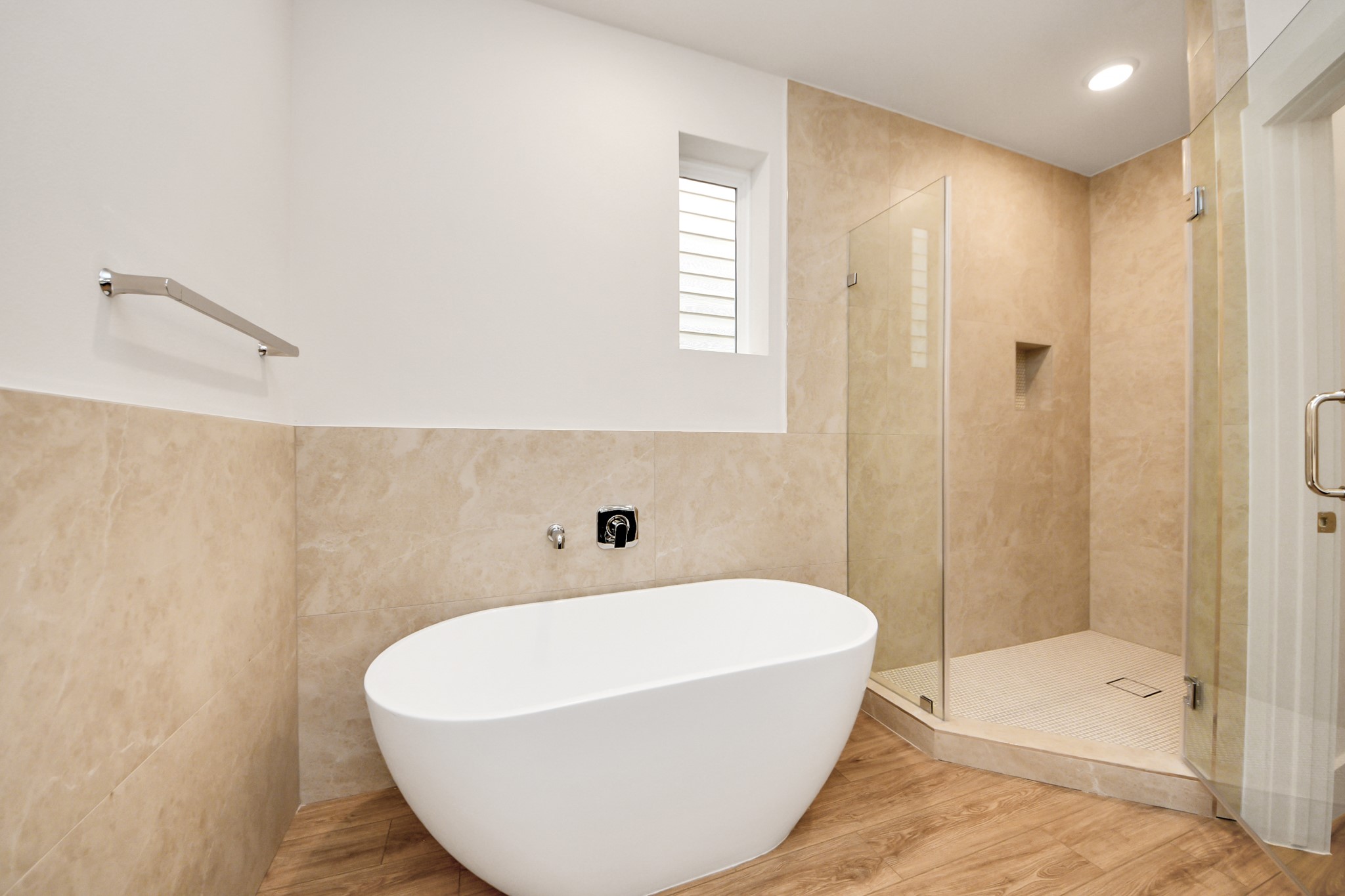 5903 Urban Pines Street Houston, TX 77091 - Photo 41 of 42 a white bath tub sitting in a bathroom