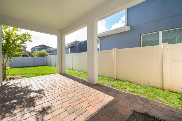 a backyard of a house with a garden