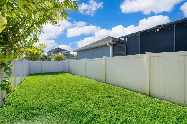 a view of backyard with dishwasher and a backyard