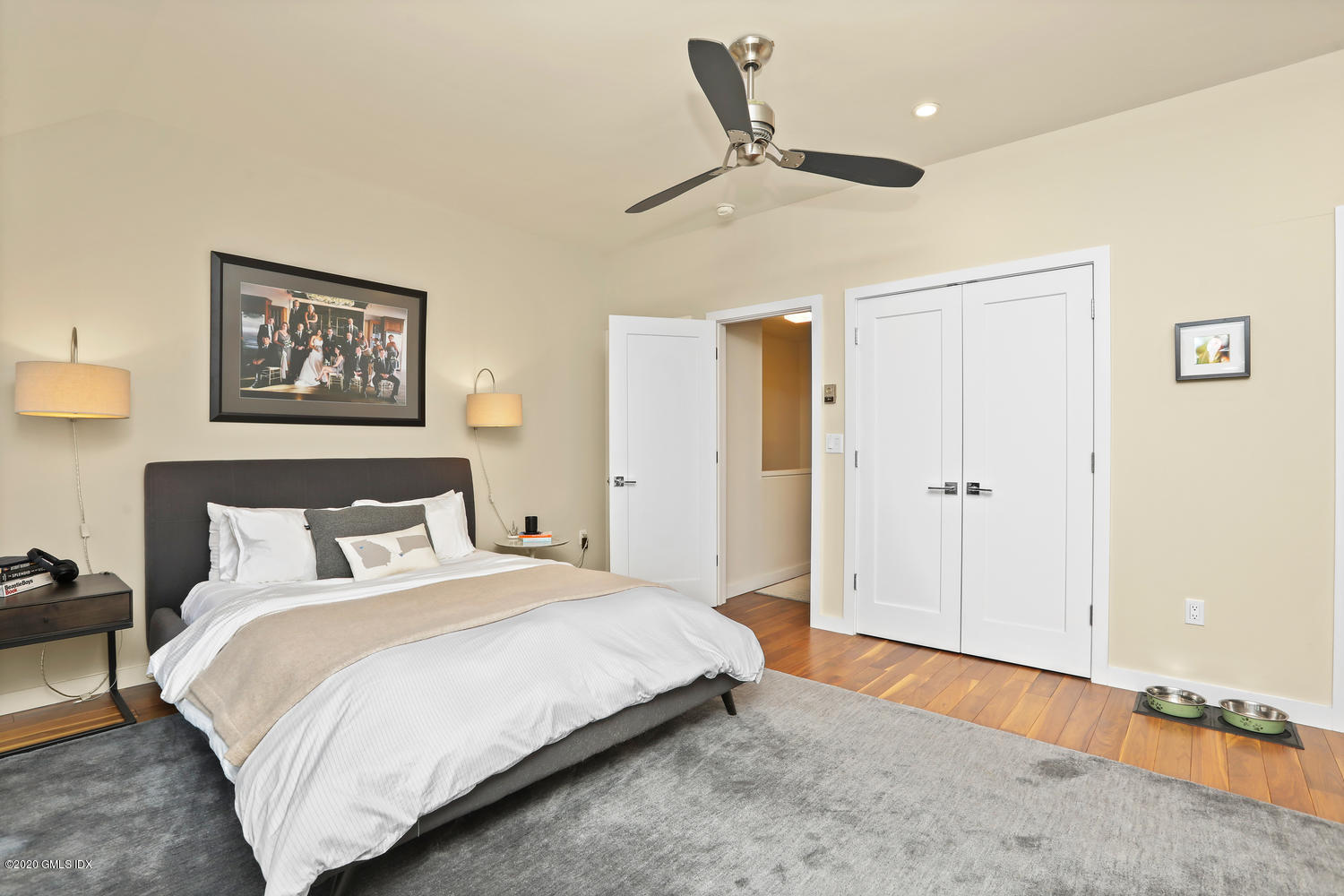 11 River Road, Unit 112 Cos Cob, CT 06807 - Photo 15 of 27 a bedroom with bed and window