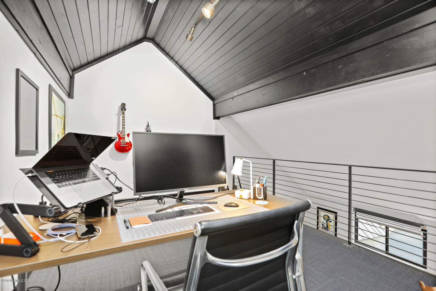 11 River Road, Unit 112 Cos Cob, CT 06807 - Photo 21 of 27 a work place with computer on desk and chair with wooden floor