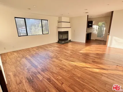 a view of a livingroom with a fireplace