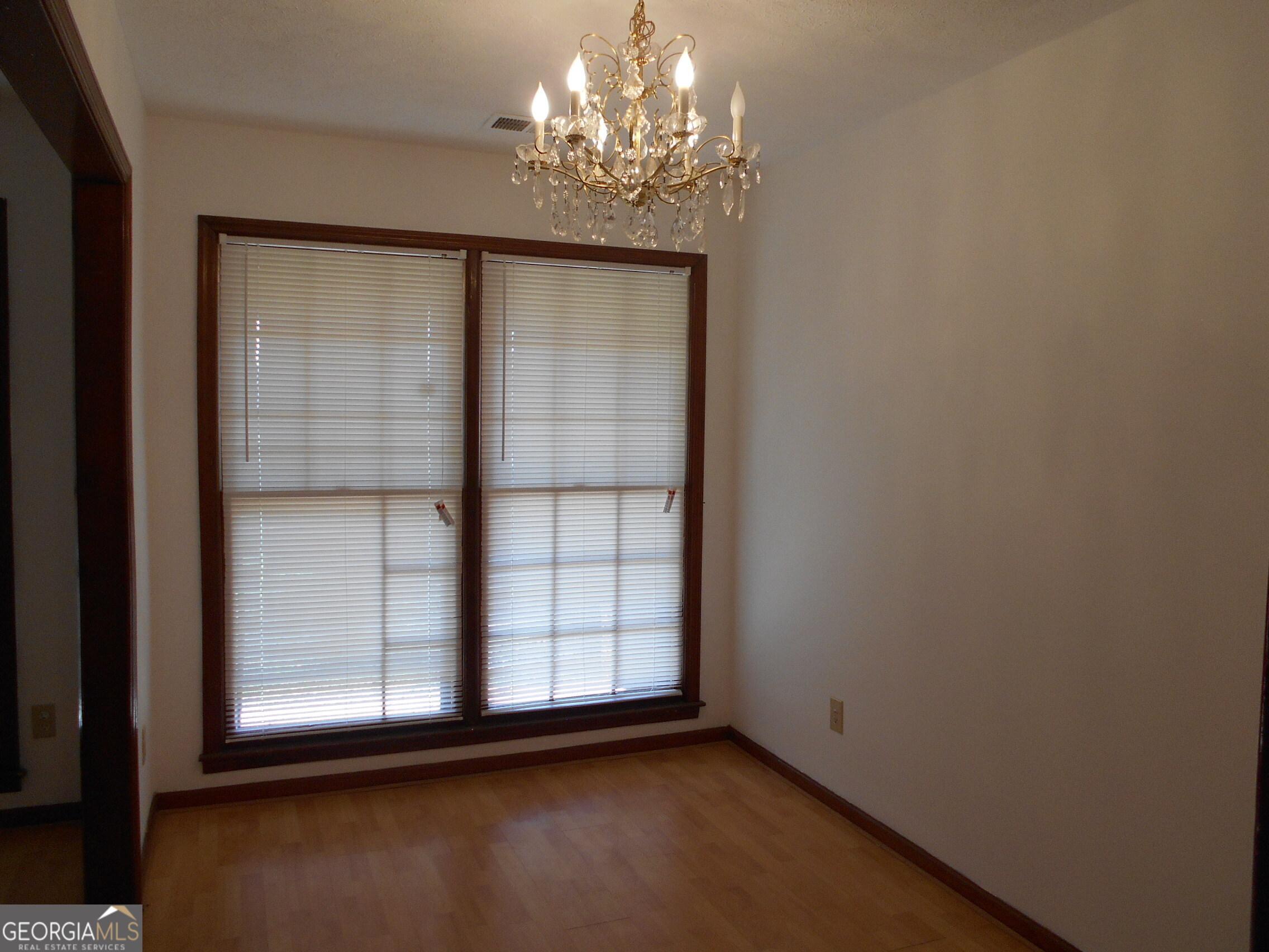 551 Racetrack Road McDonough, GA 30252 - Photo 6 of 11 a view of a chandelier in a room
