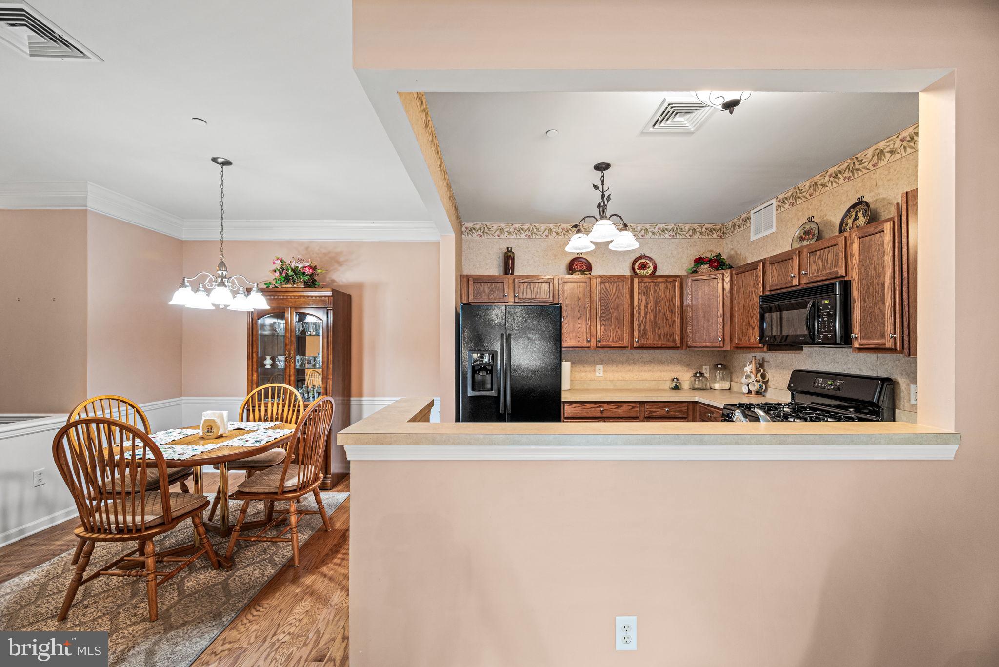 113 Creekside Drive, Unit 3 Brookhaven, PA 19015 - Photo 9 of 26 a view of a dining room with furniture
