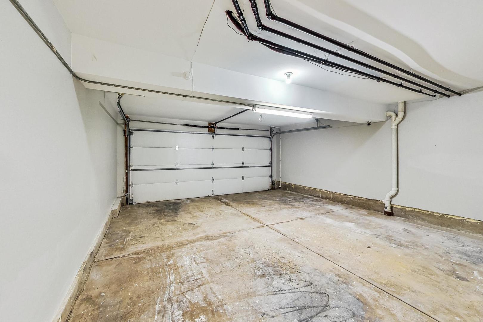 313 Rosebud Court, Unit 313 Bolingbrook, IL 60440 - Photo 29 of 31 a view of a room with an empty space