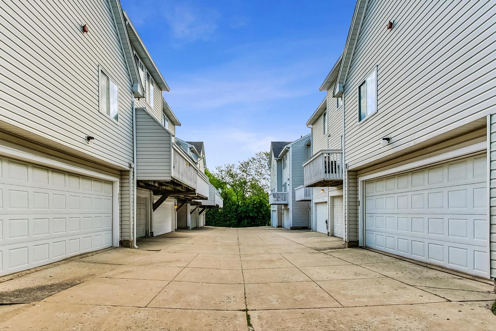 313 Rosebud Court, Unit 313 Bolingbrook, IL 60440 - Photo 31 of 31 a view of a parking space in a house