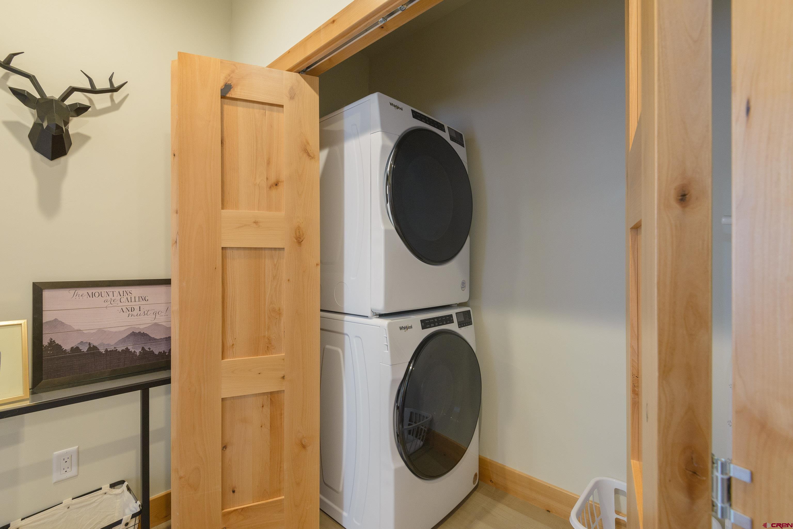 131 Elk Valley Road, Unit A Crested Butte, CO 81224 - Photo 20 of 29 a utility room with dryer and washer