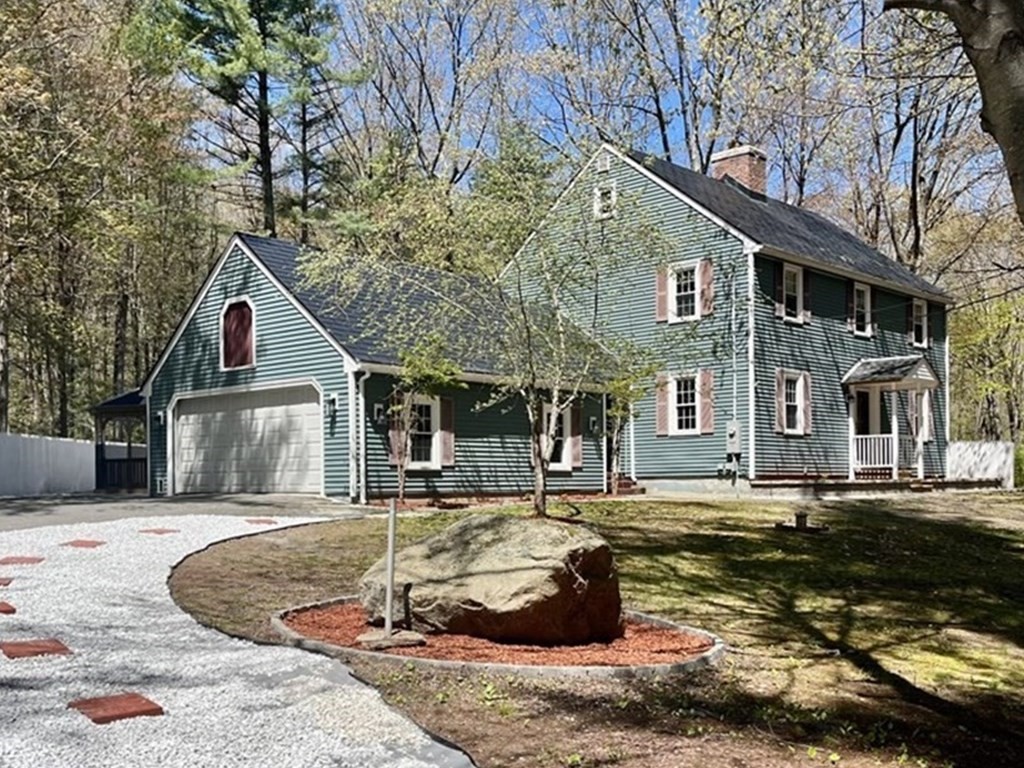 11 Boucher Road Lunenburg, MA 01462 - Photo 1 of 34 a front view of a house with a yard