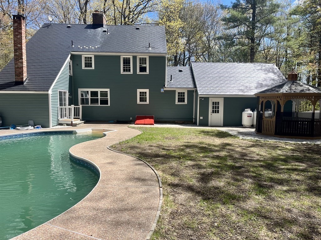 11 Boucher Road Lunenburg, MA 01462 - Photo 5 of 34 a front view of a house with a yard