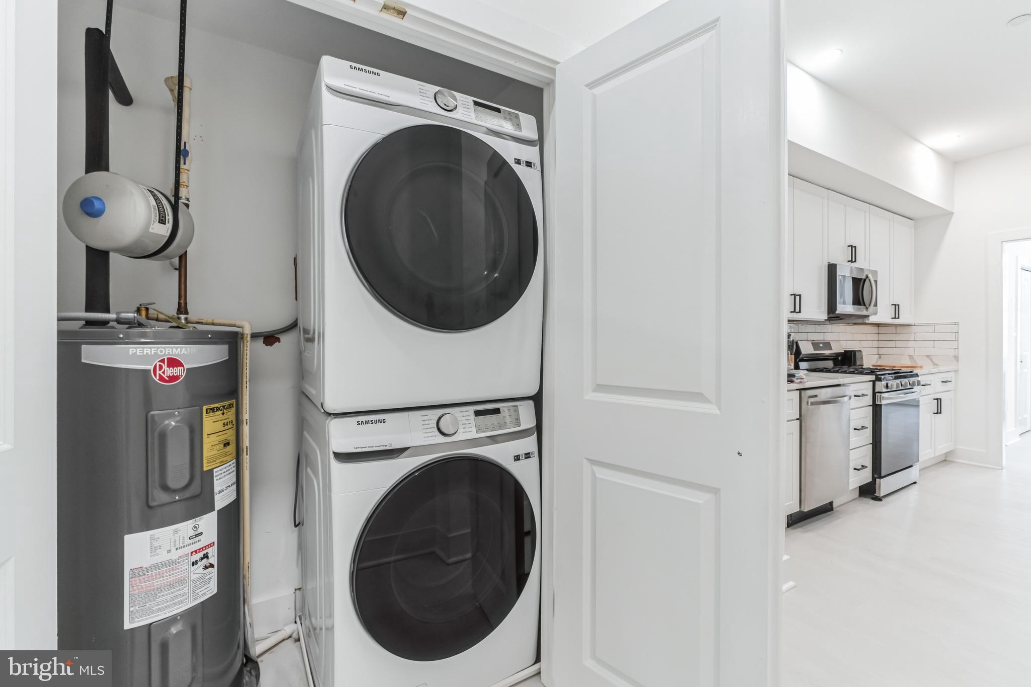 33 Florida Avenue Northeast, Unit 3 Washington, DC 20002 - Photo 12 of 15 a view of a kitchen with washer and dryer