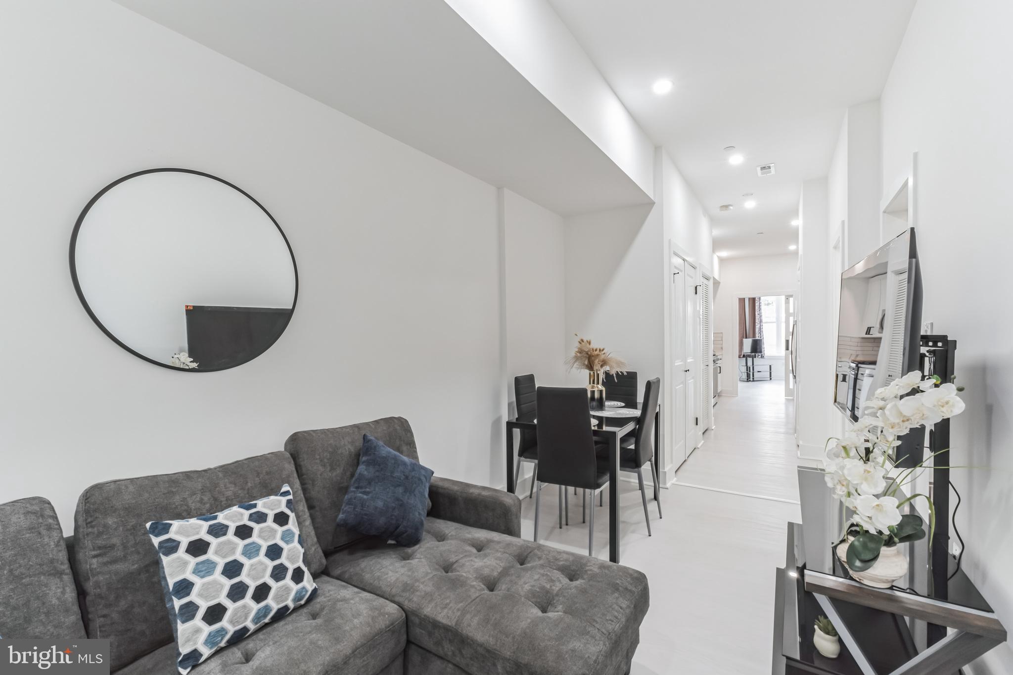 33 Florida Avenue Northeast, Unit 3 Washington, DC 20002 - Photo 8 of 15 a living room with furniture