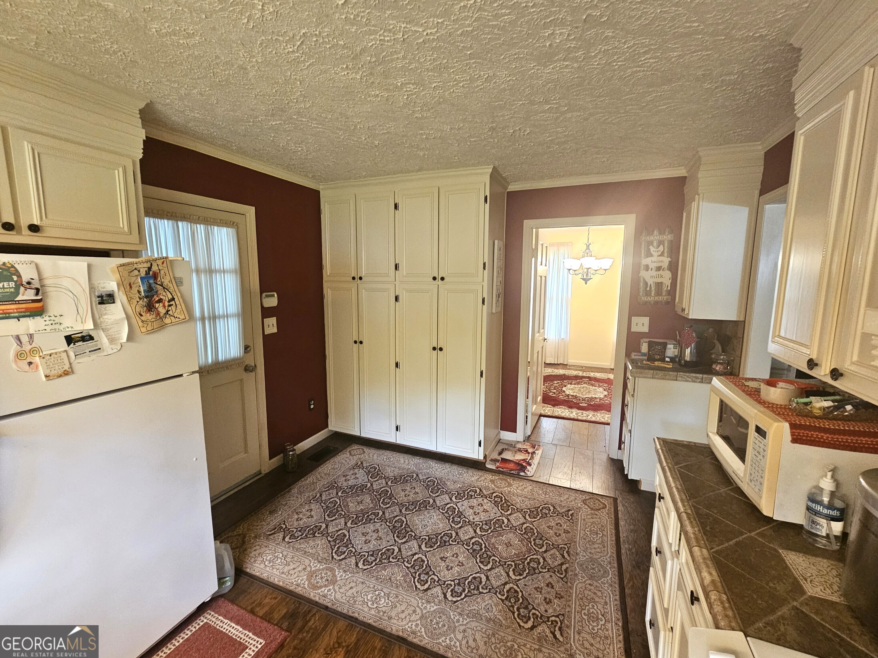 613 Old Macon Road Dublin, GA 31021 - Photo 9 of 17 a view of kitchen with refrigerator stove and sink