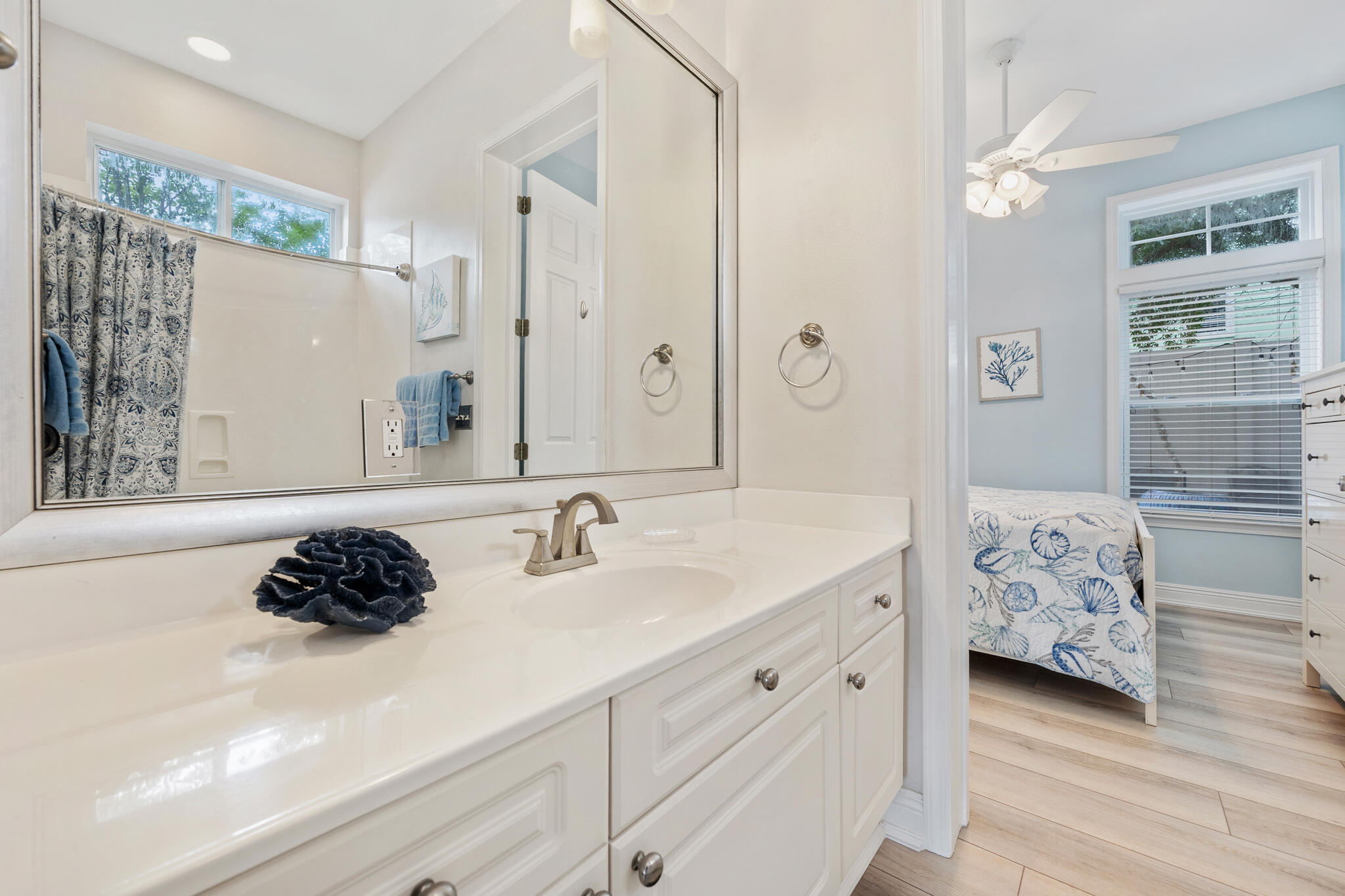 233 Redfish Circle Santa Rosa Beach, FL 32459 - Photo 26 of 73 a bathroom with a double vanity sink and mirror