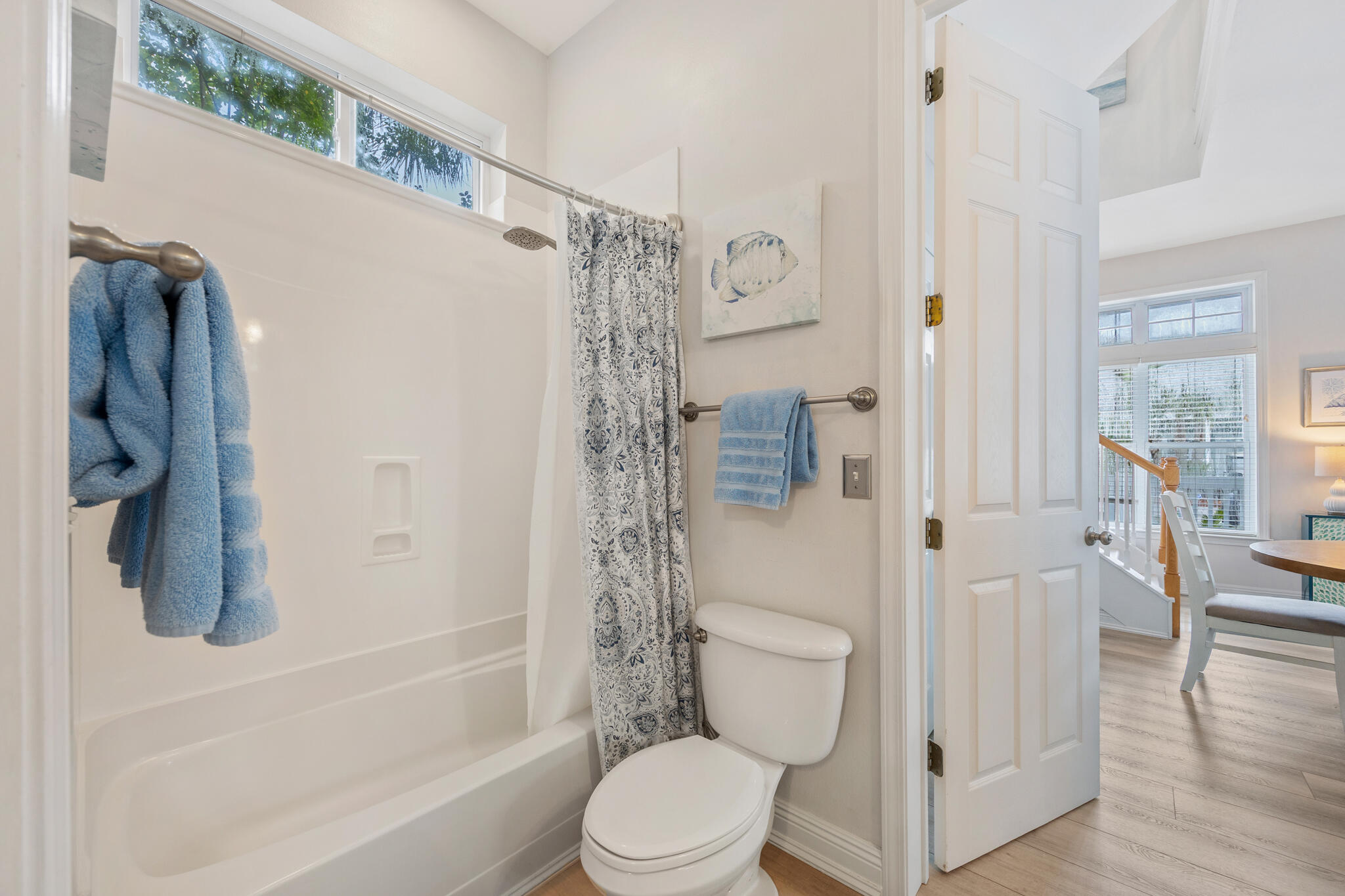 233 Redfish Circle Santa Rosa Beach, FL 32459 - Photo 27 of 73 a white toilet sitting next to a bathroom