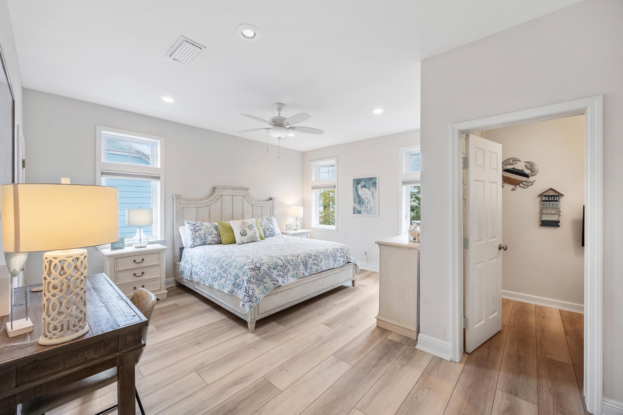 233 Redfish Circle Santa Rosa Beach, FL 32459 - Photo 31 of 73 a bedroom with a bed and wooden floor