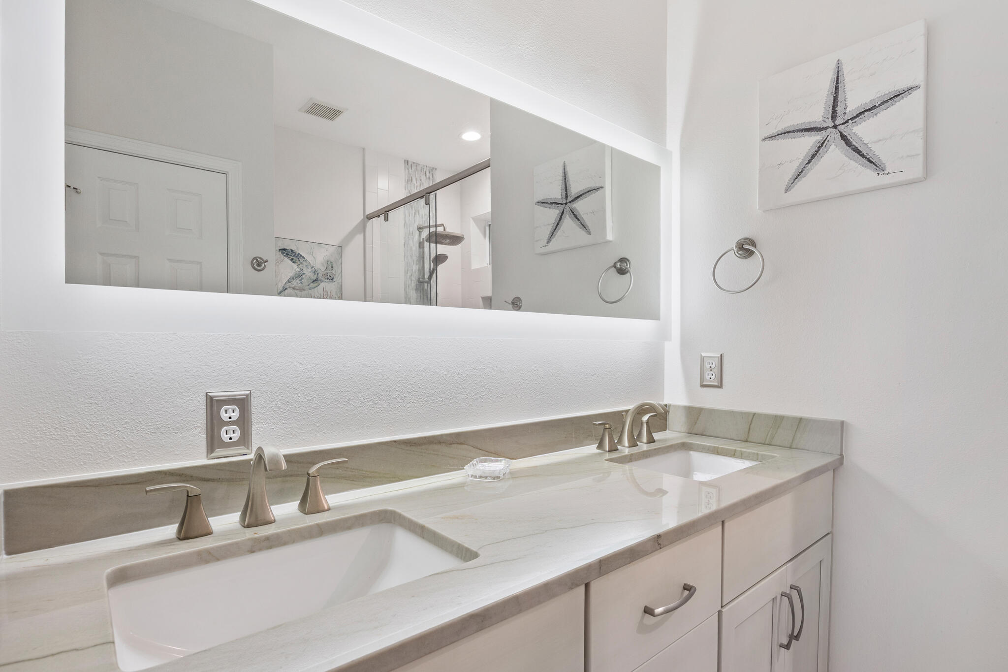 233 Redfish Circle Santa Rosa Beach, FL 32459 - Photo 34 of 73 a bathroom with a sink and a mirror