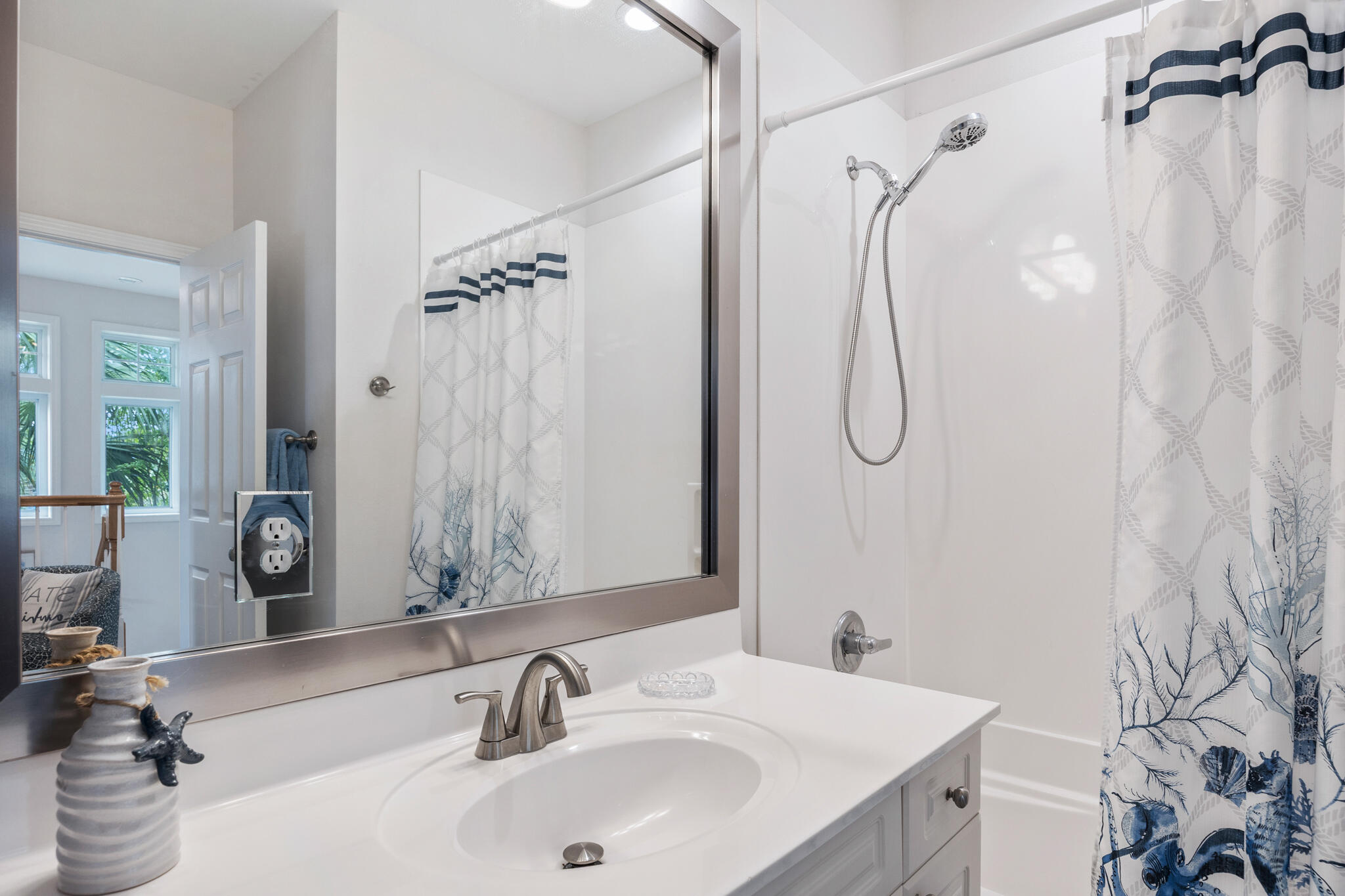 233 Redfish Circle Santa Rosa Beach, FL 32459 - Photo 37 of 73 a bathroom with a sink and a mirror