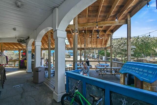 233 Redfish Circle Santa Rosa Beach, FL 32459 - Photo 56 of 73 a view of a porch with seating space