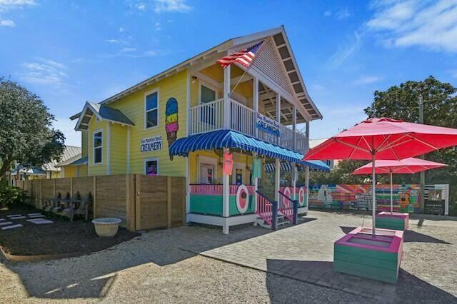 233 Redfish Circle Santa Rosa Beach, FL 32459 - Photo 57 of 73 a view of a building with sitting area