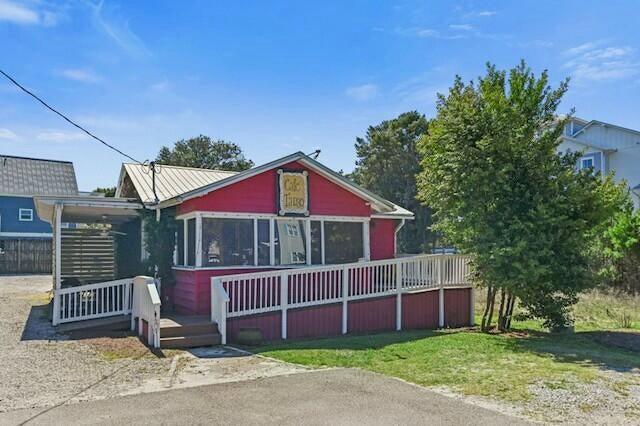 233 Redfish Circle Santa Rosa Beach, FL 32459 - Photo 68 of 73 a view of a chair and table in the backyard