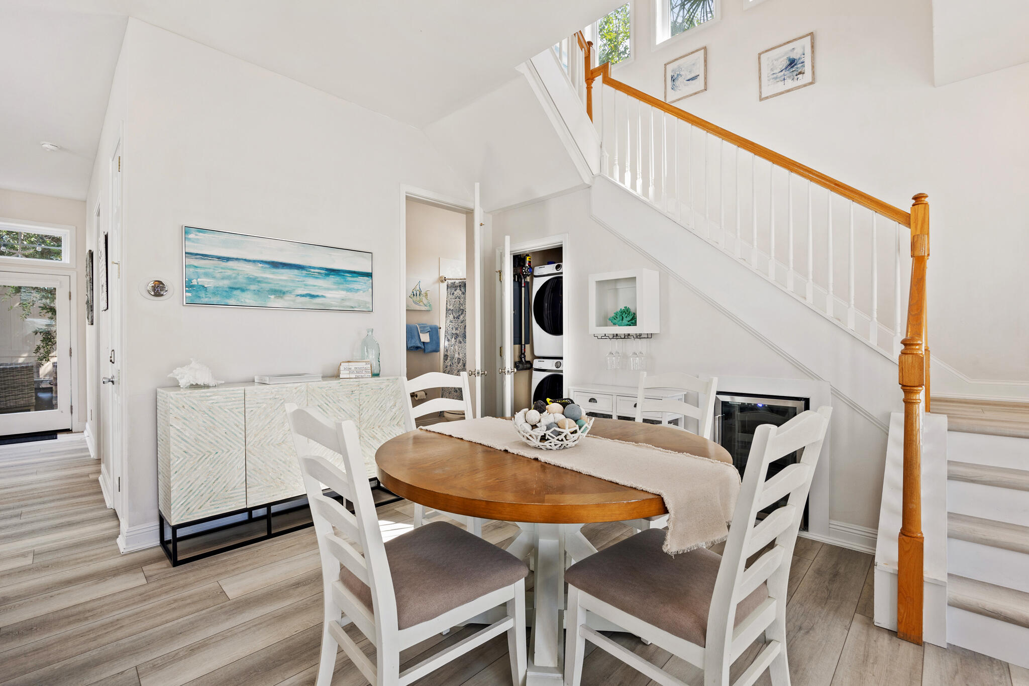 233 Redfish Circle Santa Rosa Beach, FL 32459 - Photo 10 of 73 a view of a dining room with furniture and wooden floor