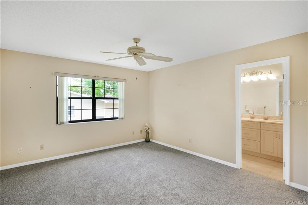 8831 East Sandpiper Drive Inverness, FL 34450 - Photo 17 of 44 a view of an empty room with a window