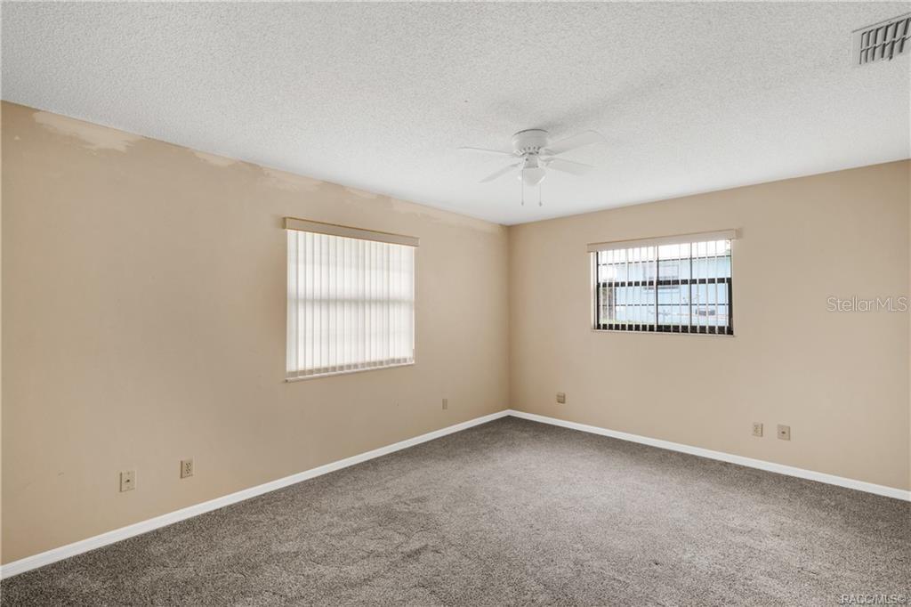 8831 East Sandpiper Drive Inverness, FL 34450 - Photo 22 of 44 an empty room with a window