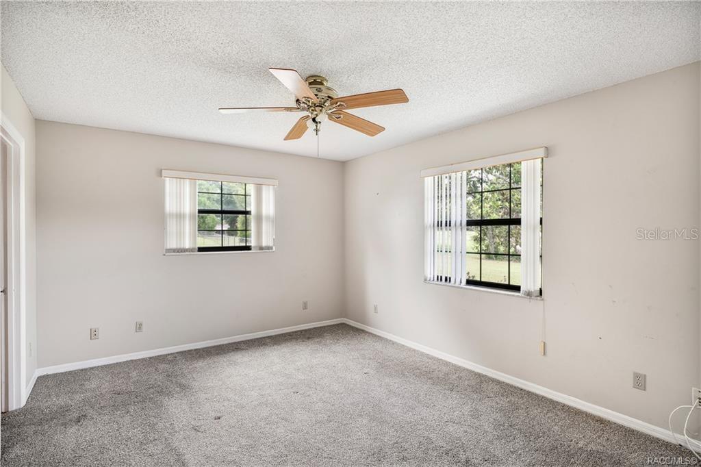 8831 East Sandpiper Drive Inverness, FL 34450 - Photo 27 of 44 a view of an empty room with a window