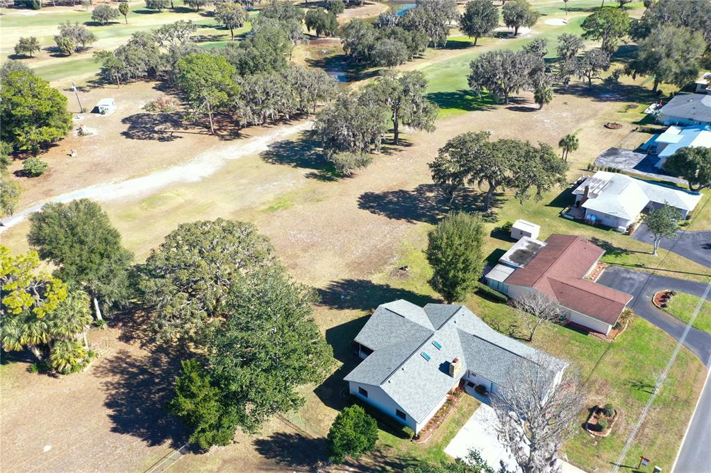 8831 East Sandpiper Drive Inverness, FL 34450 - Photo 39 of 44 an aerial view of residential house with outdoor space