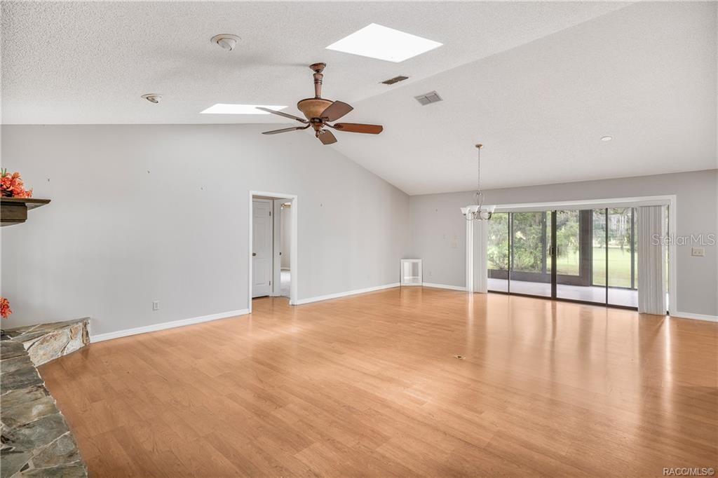 8831 East Sandpiper Drive Inverness, FL 34450 - Photo 4 of 44 a view of an empty room with a window