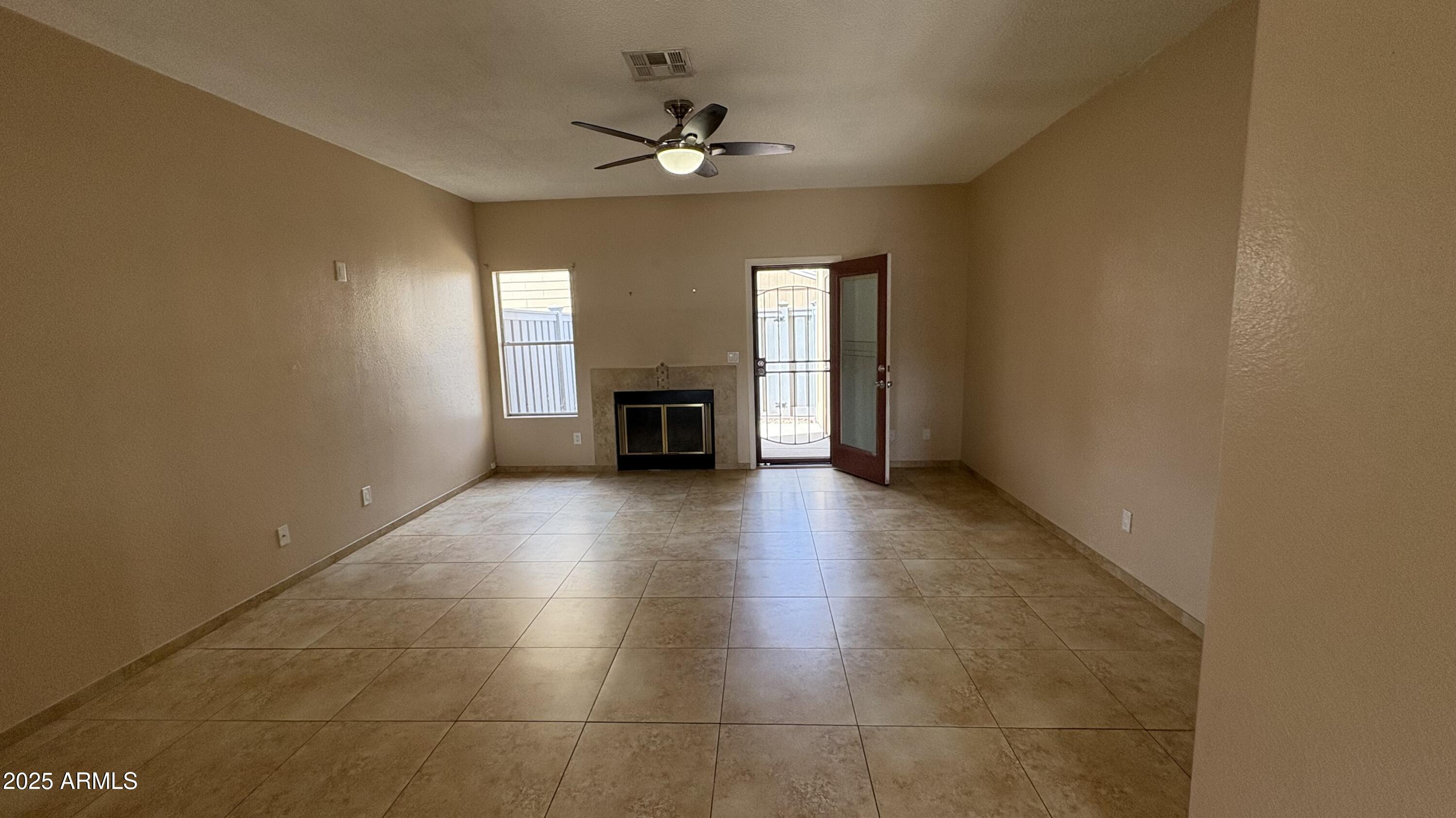 18626 North 33rd Drive, Unit 1 Phoenix, AZ 85027 - Photo 17 of 38 a view of an empty room with a window