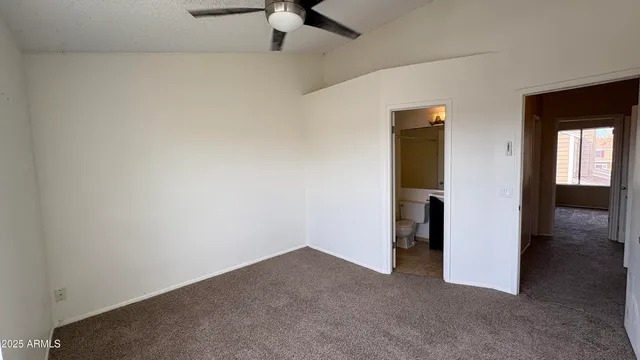 a bathroom with a toilet a sink and shower