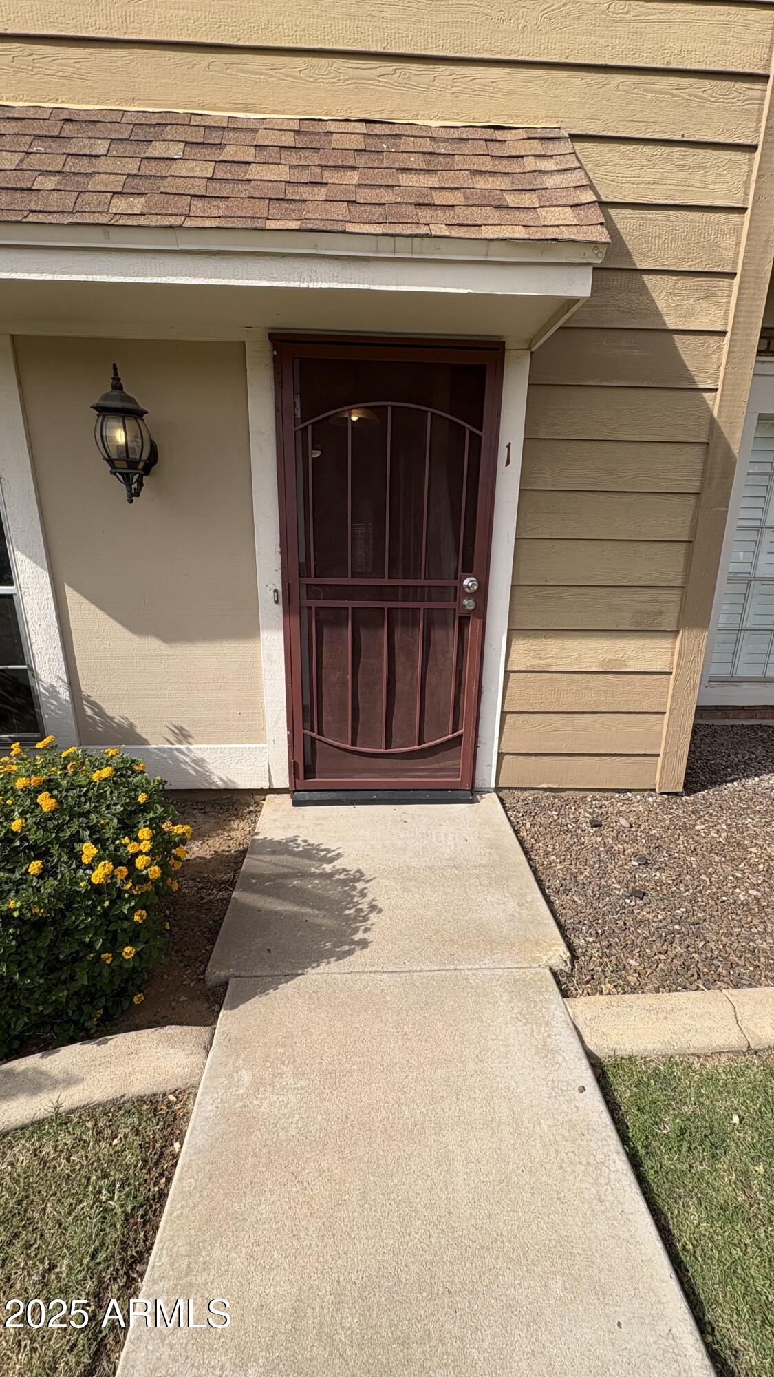 18626 North 33rd Drive, Unit 1 Phoenix, AZ 85027 - Photo 4 of 38 a front view of a house