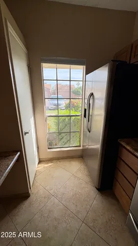 a view of empty room with windows