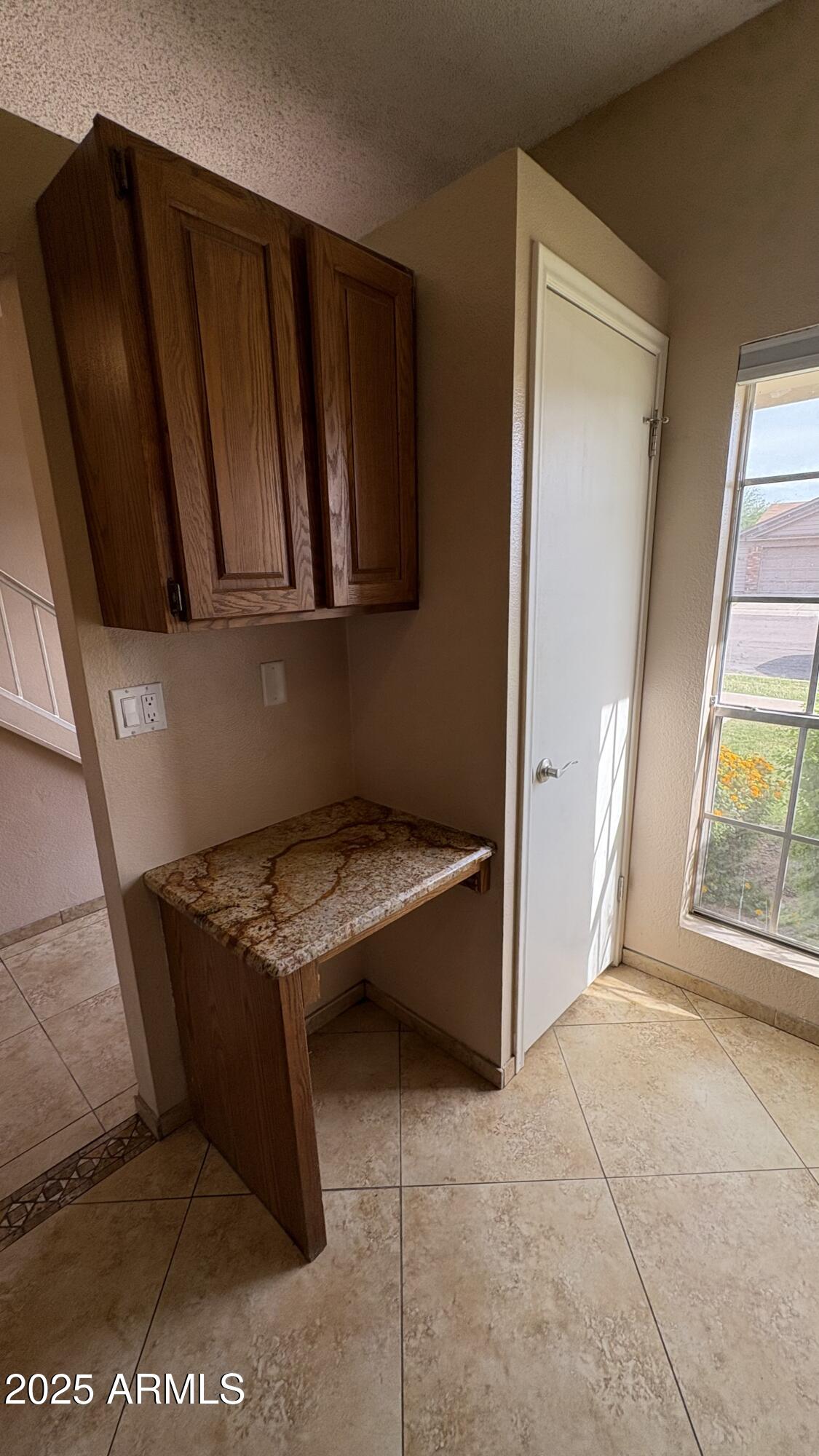 18626 North 33rd Drive, Unit 1 Phoenix, AZ 85027 - Photo 10 of 38 a view of an empty room with a window