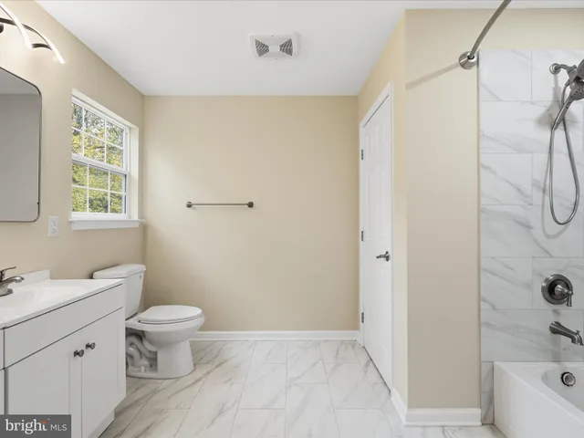 a view of an entryway with staircase