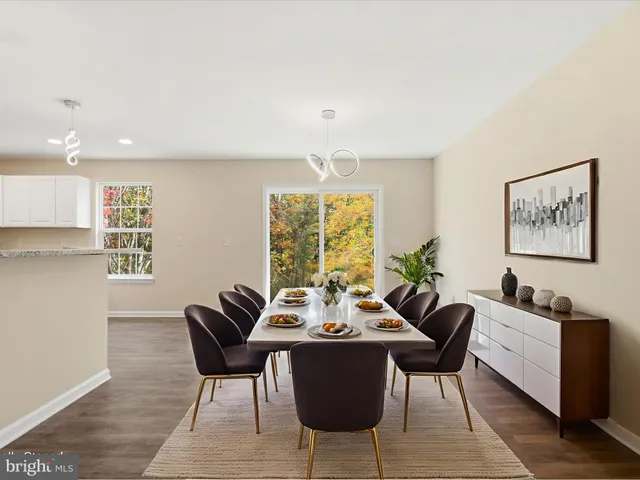 a bedroom with a bed and a chair