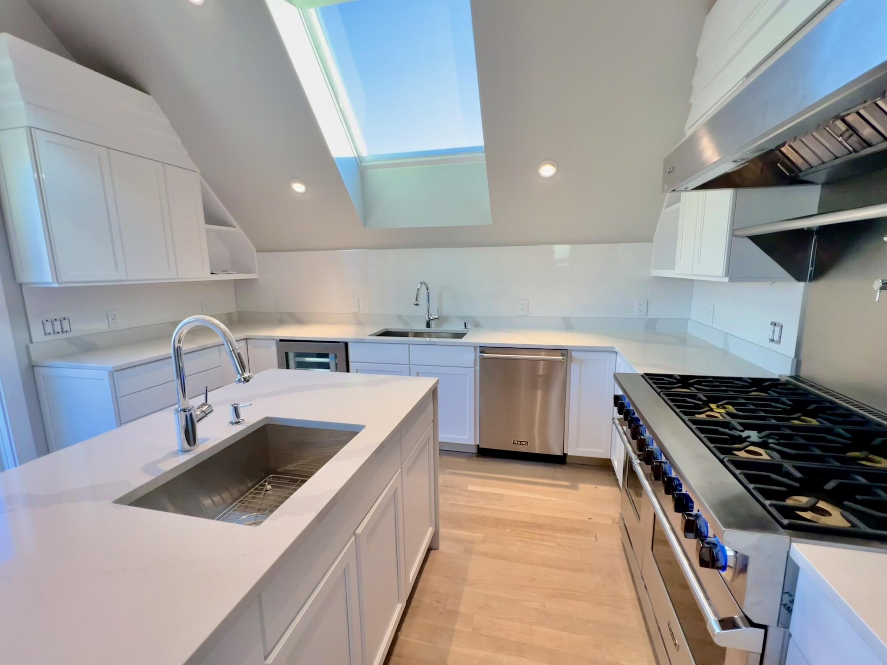 6 Race Road Provincetown, MA 02657 - Photo 11 of 30 a kitchen that has a sink and a stove
