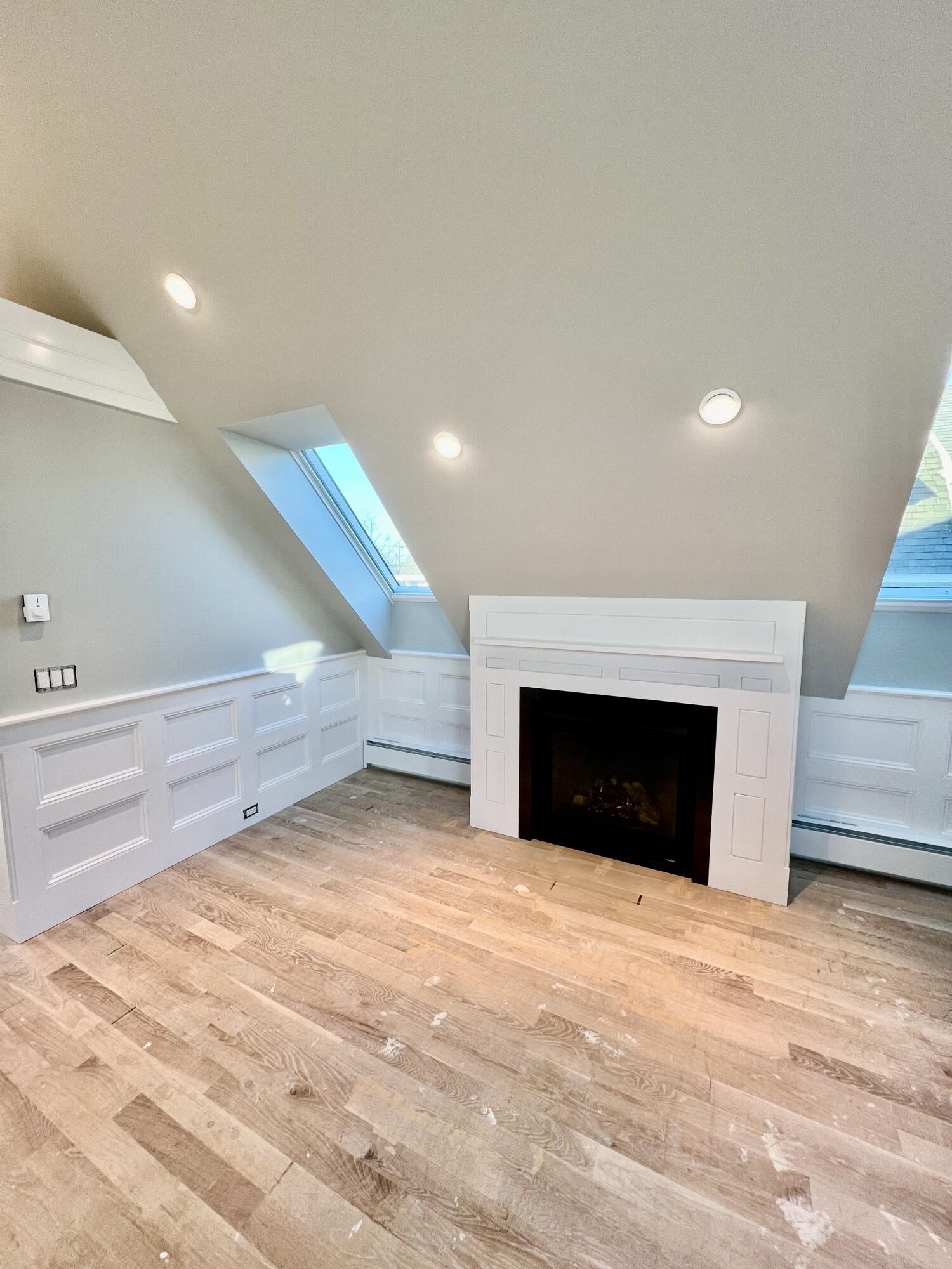 6 Race Road Provincetown, MA 02657 - Photo 12 of 30 a view of an empty room with a fireplace and a window