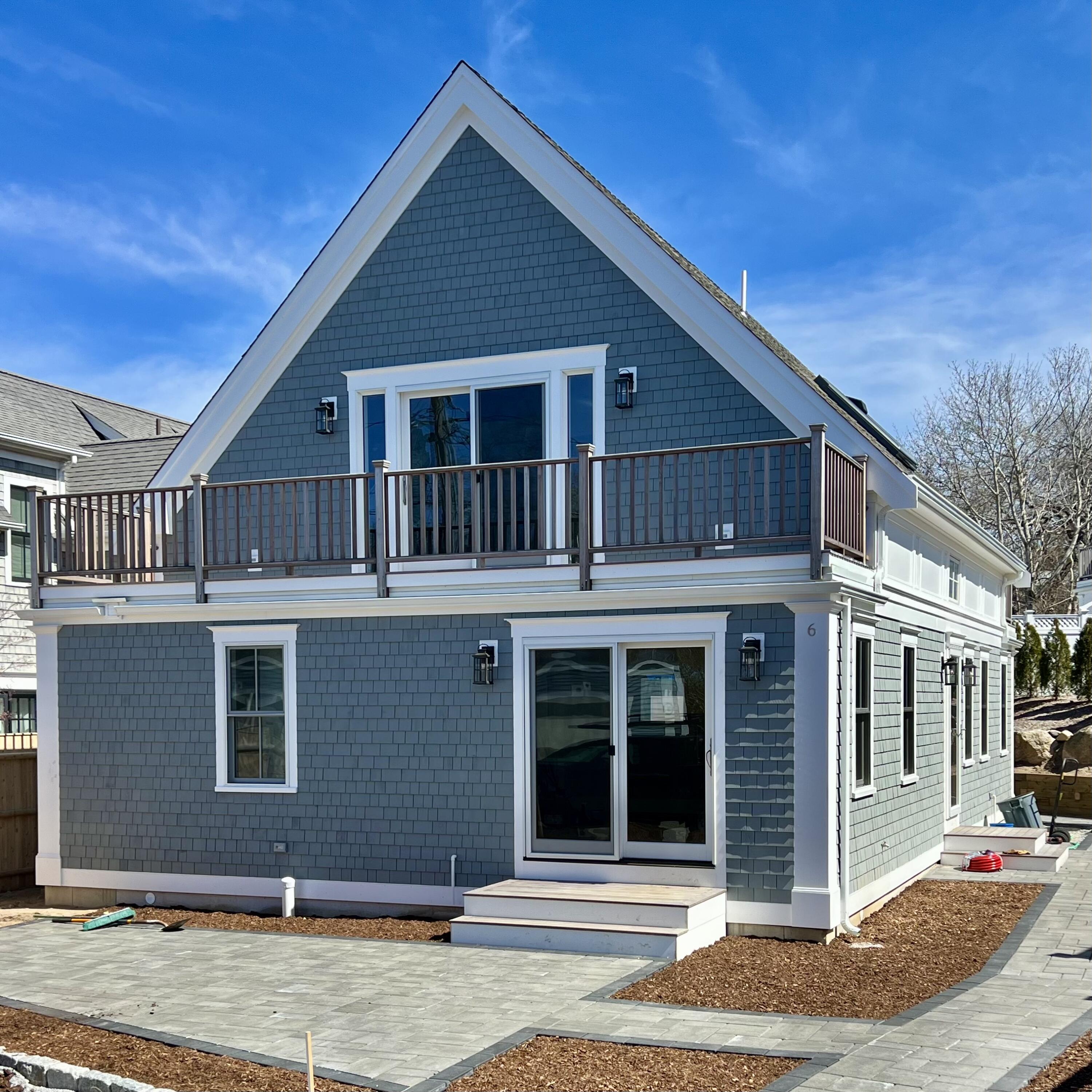 6 Race Road Provincetown, MA 02657 - Photo 2 of 30 a front view of a house with a yard