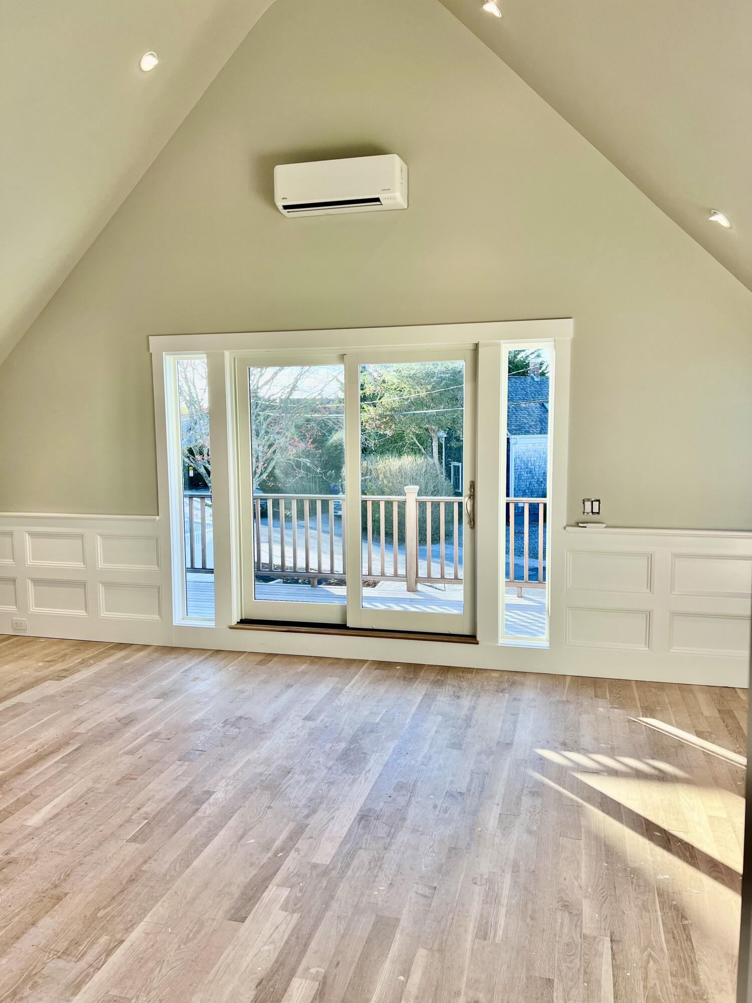 6 Race Road Provincetown, MA 02657 - Photo 6 of 30 a view of an empty room with glass door