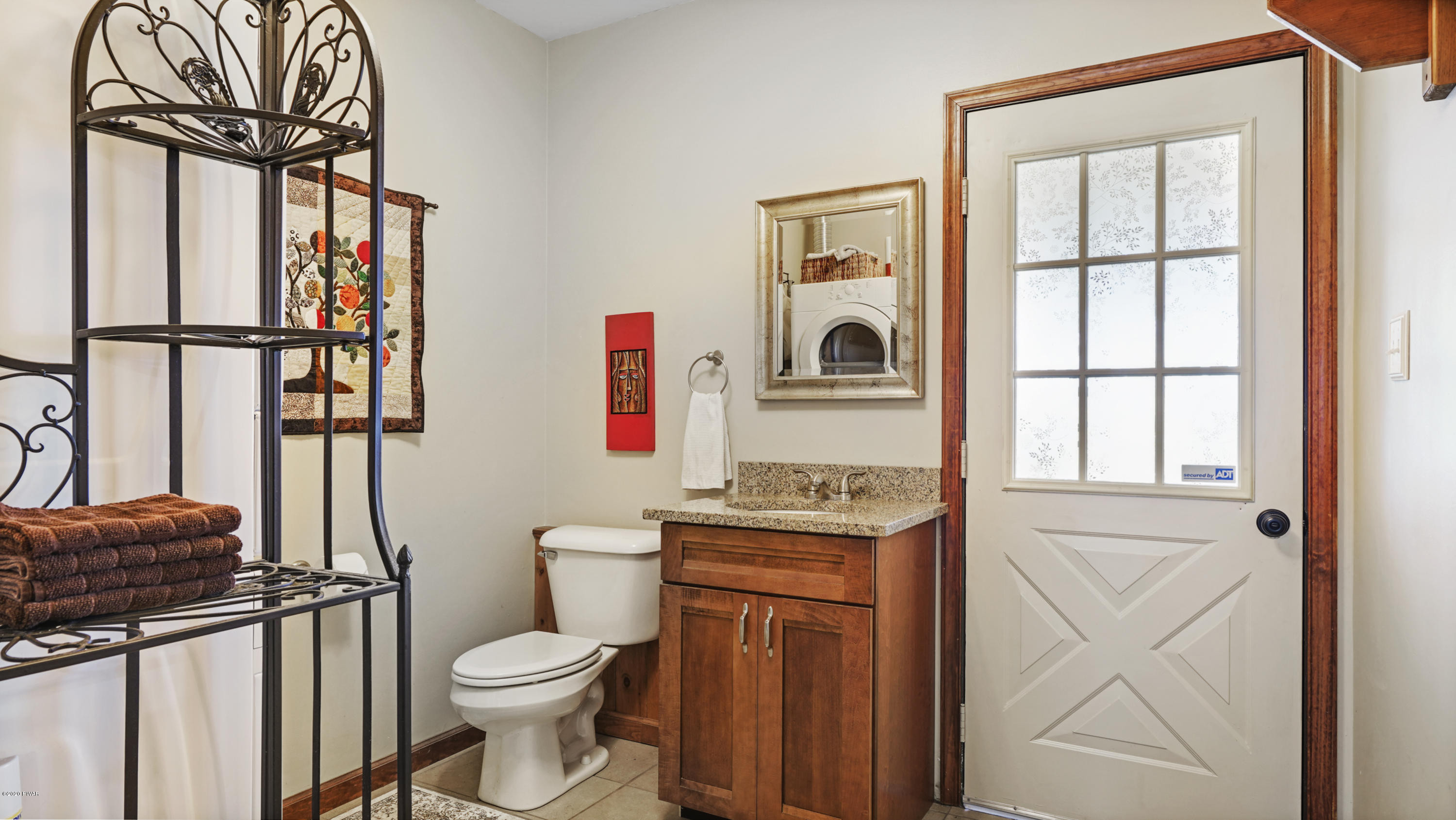 161 J J Road Moscow, PA 18444 - Photo 68 of 73 a bathroom with a toilet a sink and a window