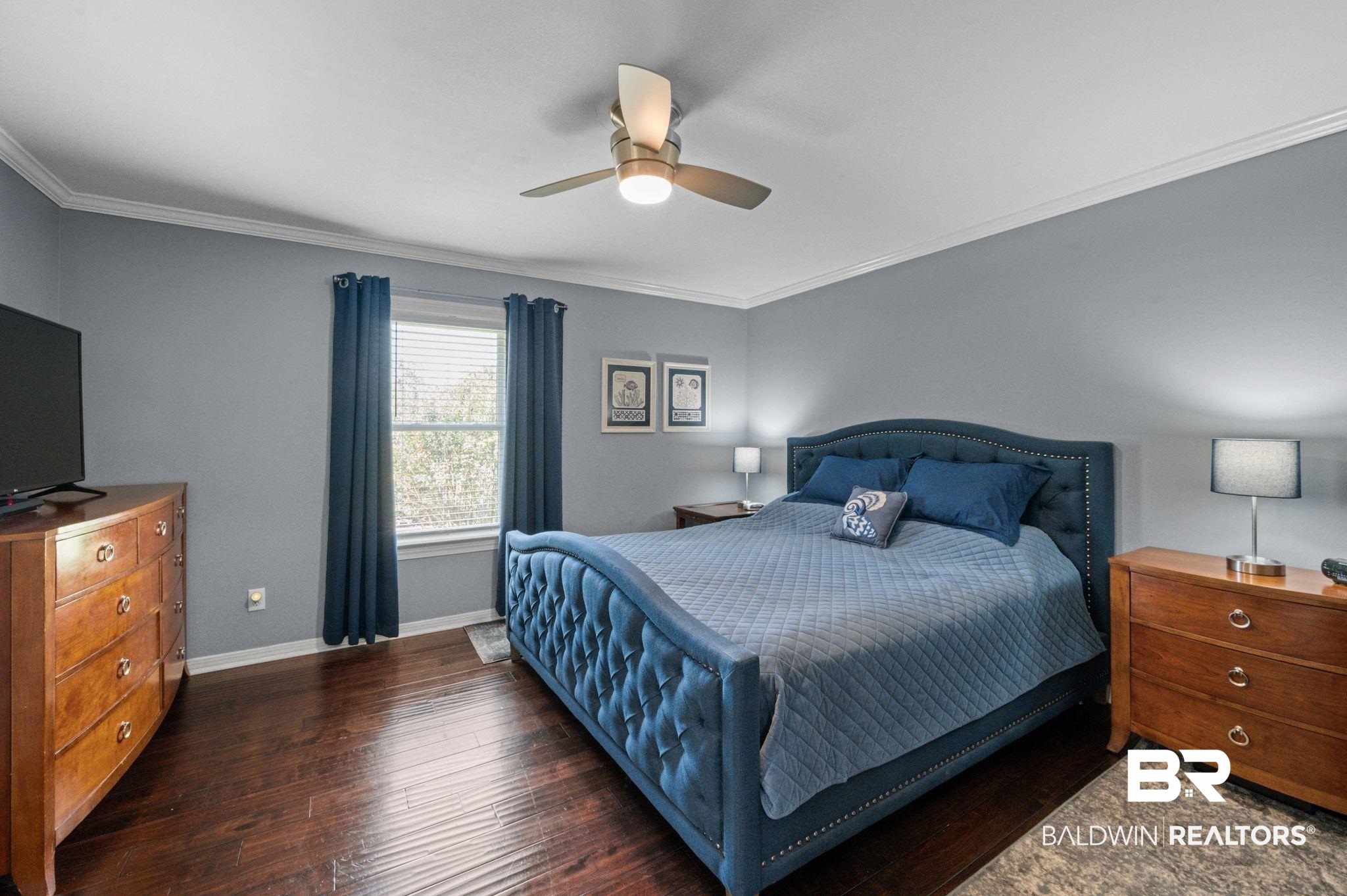 20037 County Road 33 Fairhope, AL 36532 - Photo 20 of 79 Bedroom with ornamental molding, ceiling fan, and dark hardwood / wood-style flooring