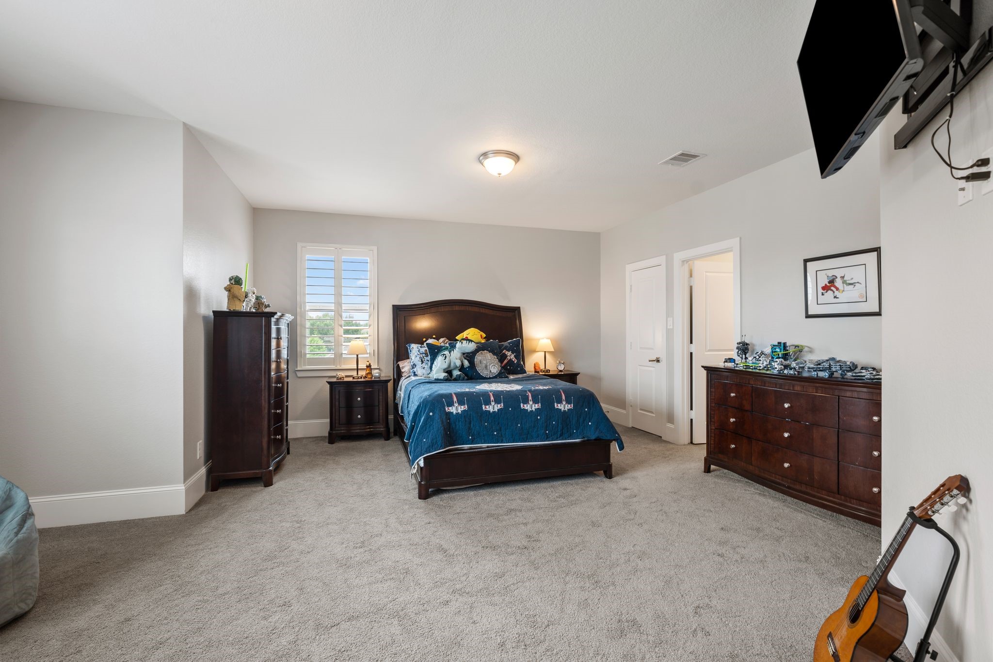2926 Fairmont Ridge Lane Katy, TX 77494 - Photo 37 of 49 a bedroom with bed and window
