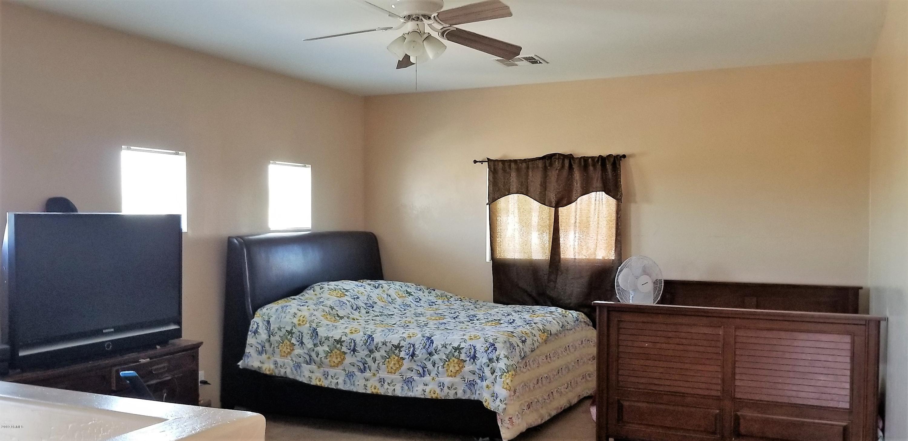 10041 West Chipman Road Tolleson, AZ 85353 - Photo 11 of 37 den