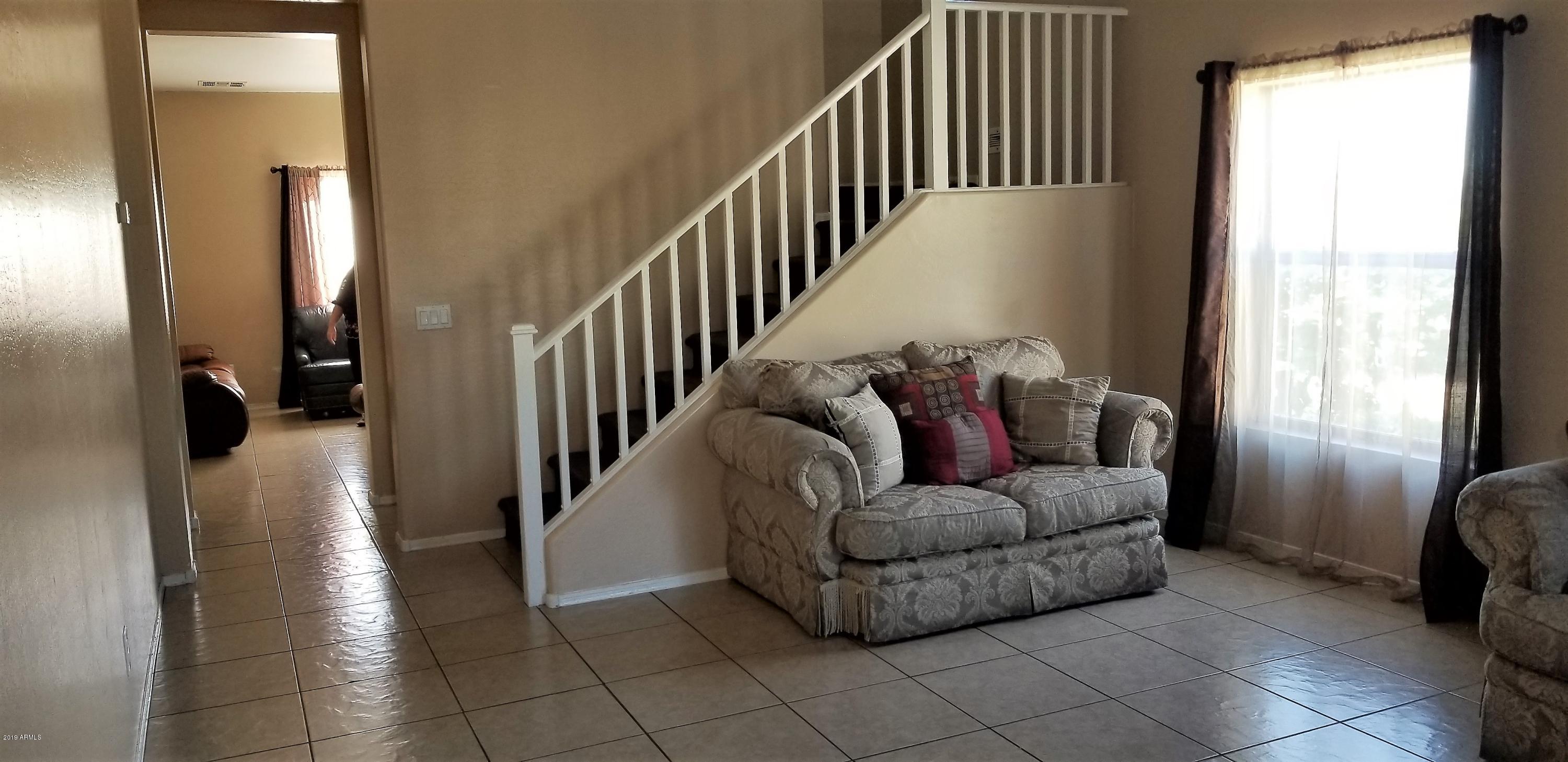 10041 West Chipman Road Tolleson, AZ 85353 - Photo 3 of 37 inside1