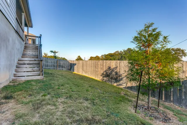 a view of outdoor space and yard