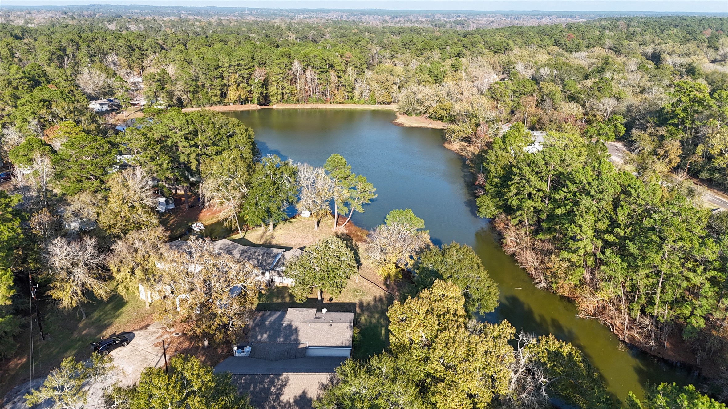 174 W Creek Trinity, TX 75862 - Photo 32 of 49 an aerial view of residential building with outdoor space and trees all around